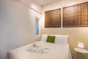Postel nebo postele na pokoji v ubytování Maritime Suites by Stellar ALV