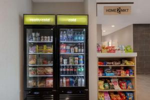 Supermarket nebo jiné obchody v  hotelu nebo okolí