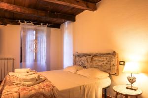 Posteľ alebo postele v izbe v ubytovaní B&B Luna & Stelle