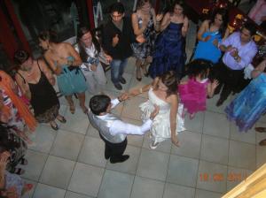a bride and groom dancing on a dance floor at Eco Hotel Locanda del Giglio in Roveredo Capriasca