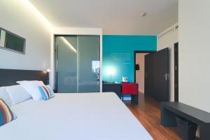Postel nebo postele na pokoji v ubytování Sea You Hotel Port Valencia