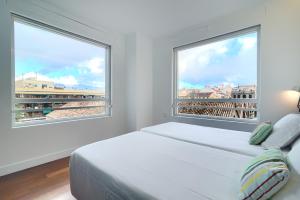 Postel nebo postele na pokoji v ubytování Sea You Hotel Port Valencia
