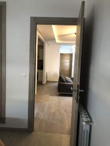 Ένα ή περισσότερα κρεβάτια σε δωμάτιο στο Cosy appartement +3 φωτογραφίες
