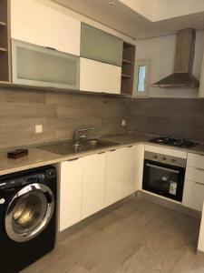 Η κουζίνα ή μικρή κουζίνα στο Cosy appartement