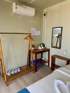 Postel nebo postele na pokoji v ubytování Naroth Beach Bungalow