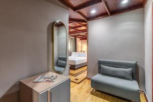 Postel nebo postele na pokoji v ubytování Madison Hotel