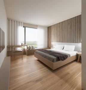 Postel nebo postele na pokoji v ubytování Hotel Loa