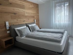 A bed or beds in a room at Casa Vacanze - Green Garden