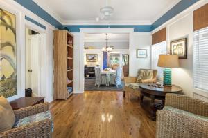 a living room with a couch and a table at Casa De Cuba in Key West