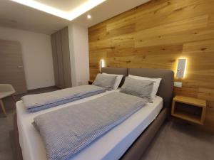 A bed or beds in a room at Casa Vacanze - Green Garden