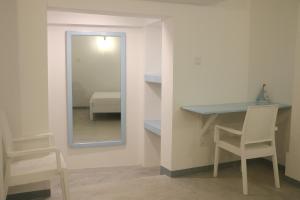 Postel nebo postele na pokoji v ubytování A.V.N HOMESTAY