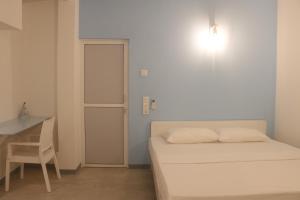 Postel nebo postele na pokoji v ubytování A.V.N HOMESTAY