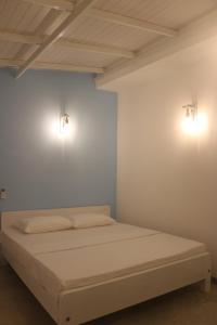 Postel nebo postele na pokoji v ubytování A.V.N HOMESTAY