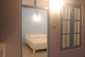 Postel nebo postele na pokoji v ubytování A.V.N HOMESTAY