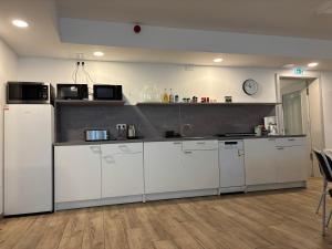 Η κουζίνα ή μικρή κουζίνα στο Gästehaus Bernau OT Schönow +5 φωτογραφίες