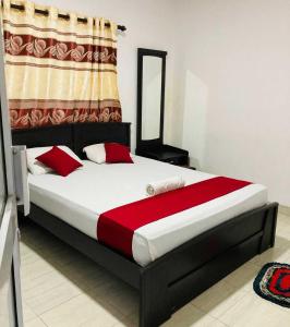 Letto o letti in una camera di Tunnel Side Hotel Ramboda