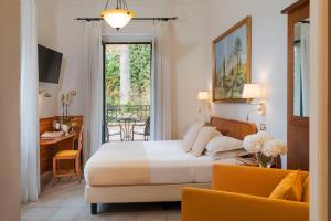 Postel nebo postele na pokoji v ubytování Hotel Villa Schuler