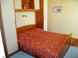 Postel nebo postele na pokoji v ubytování Apartments Klaric