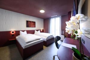 Lova arba lovos apgyvendinimo įstaigoje BRIX - Self Check-In Hotel