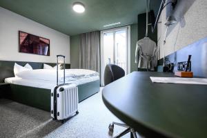 Lova arba lovos apgyvendinimo įstaigoje BRIX - Self Check-In Hotel