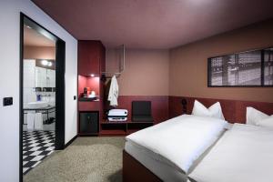 Lova arba lovos apgyvendinimo įstaigoje BRIX - Self Check-In Hotel
