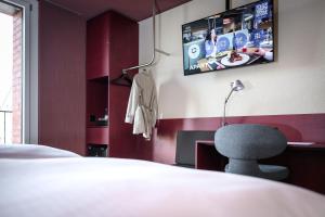 Lova arba lovos apgyvendinimo įstaigoje BRIX - Self Check-In Hotel