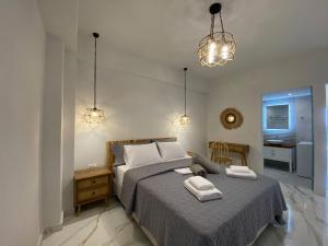 Postel nebo postele na pokoji v ubytování Ocean Blue 2, Seaside Suite