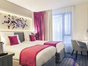 Katil atau katil-katil dalam bilik di Mercure Toulouse Sud