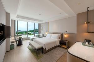 Fotografie z fotogalerie ubytování Nanjing Yangzi River Conference Center Longshan Lake Hotel v destinaci Nan-ťing