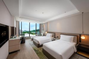 Fotografie z fotogalerie ubytování Nanjing Yangzi River Conference Center Longshan Lake Hotel v destinaci Nan-ťing