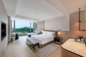 Fotografie z fotogalerie ubytování Nanjing Yangzi River Conference Center Longshan Lake Hotel v destinaci Nan-ťing