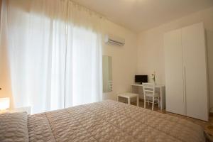 Postel nebo postele na pokoji v ubytování B&B Siracusa Holidays