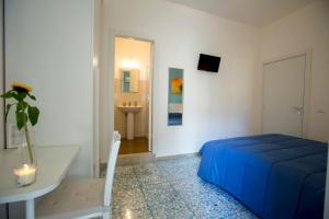 Postel nebo postele na pokoji v ubytování B&B Siracusa Holidays