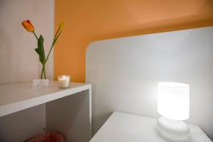 Postel nebo postele na pokoji v ubytování B&B Siracusa Holidays