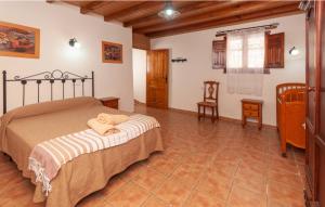 a bedroom with a bed in a room at Charming House in Montefrío with Private Pool in Montefrío