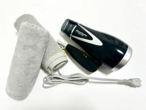 een sok, een fles en een haardroger bij 大国町駅徒歩3分 なんば駅1駅 最大4名 ロイヤル507 in Osaka