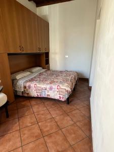 Postel nebo postele na pokoji v ubytování maison iris