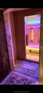 an outside view of a bathroom with a window at Gîte 4 étoiles - Sauna & Balnéo jacuzzi privatifs in Orléans