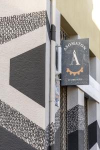Majutusasutuses Asomaton by Oniro olev sertifikaat, autasu, silt või muu dokument
