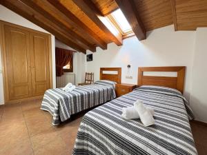 Postel nebo postele na pokoji v ubytování Apartamentos Casa Riu - Villmor