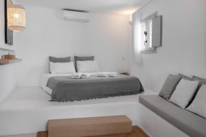 Postel nebo postele na pokoji v ubytování myMykonos Guest House