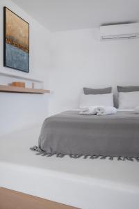 Postel nebo postele na pokoji v ubytování myMykonos Guest House