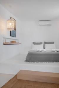 Postel nebo postele na pokoji v ubytování myMykonos Guest House