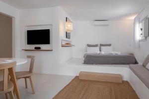 Postel nebo postele na pokoji v ubytování myMykonos Guest House