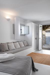 Postel nebo postele na pokoji v ubytování myMykonos Guest House