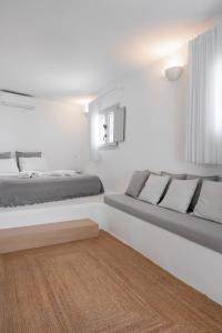 Postel nebo postele na pokoji v ubytování myMykonos Guest House