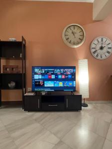 A television and/or entertainment centre at Ira Apartments