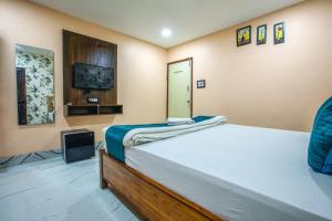 Postel nebo postele na pokoji v ubytování Hotel silver star + 7 fotografií