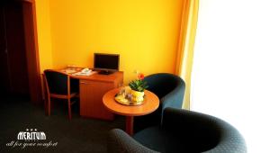TV a/nebo společenská místnost v ubytování Hotel Meritum