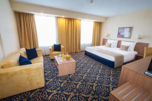 Hotel Monogram Park客房内的一张或多张床位